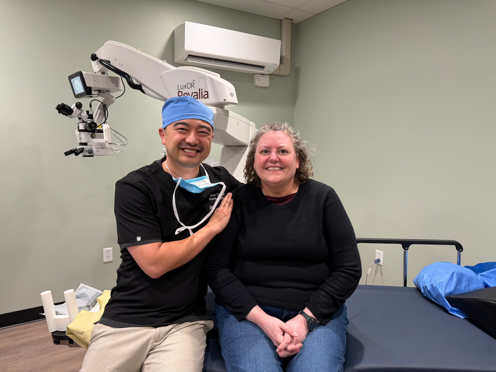 Smiling patient with Dr. Jack Tian